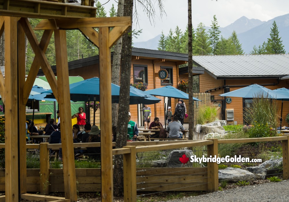 Gem Mining Water With Gift Shop and Visitors in Background