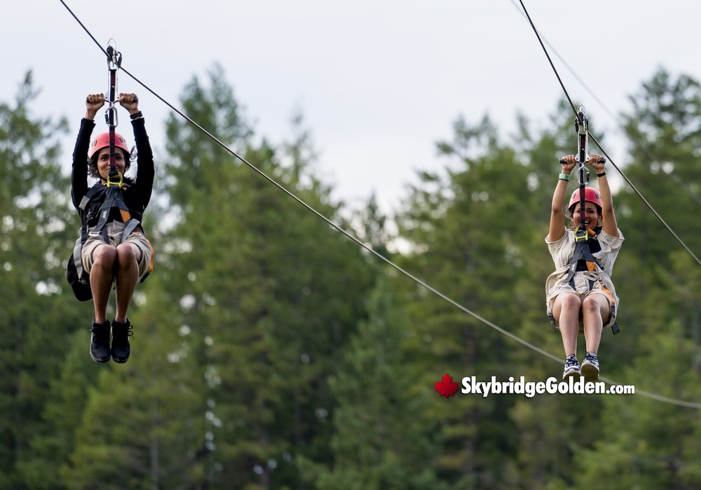 Two Visitors on Zipline with Platform View
